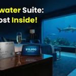 A luxury booking concept showing the cost of the Atlantis underwater suite.